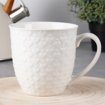 Kubek ceramiczny z uchem do picia kawy herbaty napojów serca biały 580 ml