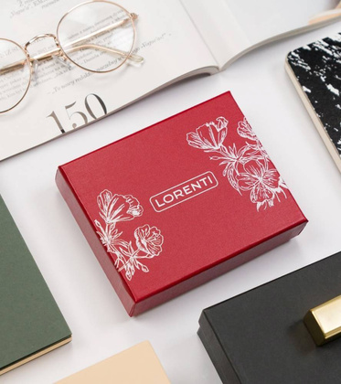 Portmonetka damska z wężowym wzorem — Lorenti