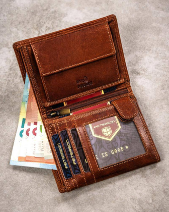 Duży, skórzany portfel męski z wytłoczonym znakiem zodiaku