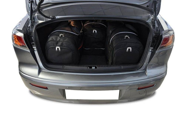 MITSUBISHI LANCER LIMOUSINE 2007-2016 TORBY DO BAGAŻNIKA 4 SZT KJUST