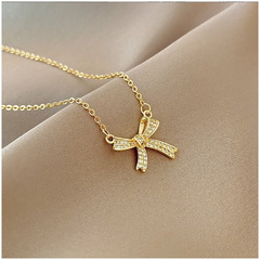 Naszyjnik stal szlachetna pozłacana 14k złotem KOKARDA cyrkonie NST2166