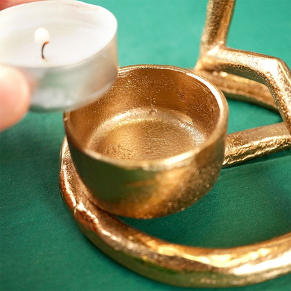 Świecznik na świeczkę tealight aluminiowy złoty gwiazda 15,5 cm