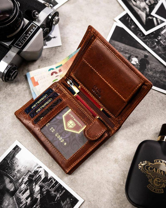 Duży, skórzany portfel męski z wytłoczonym znakiem zodiaku