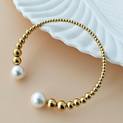 Bransoletka na rękę stal chirurgiczna pozłacana 14k złotem, perły BST1563