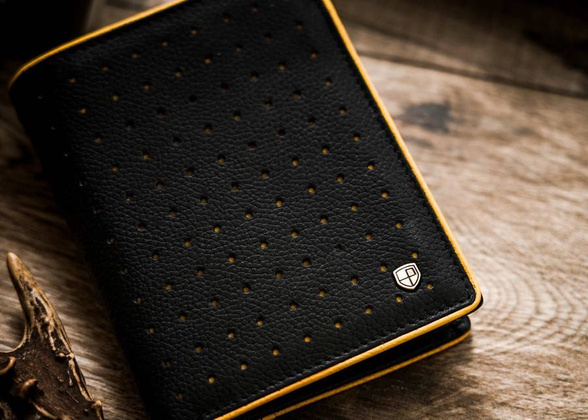 Skórzany portfel męski z kontrastowym obszyciem