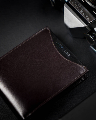 Cienki portfel meski z naturalnej skory licowej ze schowkiem na suwak