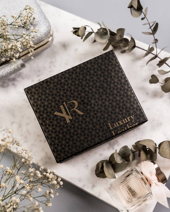 Skórzany portfel damski z ozdobnym zapięciem